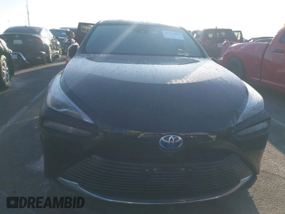 2022 Toyota Mirai XLE with VIN JTDAAAAA9NA007013, listed as a IAAI auction lot 41744965 with 23,243 mi miles and . Bid and sale history available at DreamBid. Image 12.