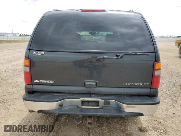 2003 Chevrolet Tahoe LS with VIN 1GNEK13ZX3J311862, listed as a Copart auction lot 54872545 with 198,579 mi miles and Salvage Title. Bid and sale history available at DreamBid. Image 6.