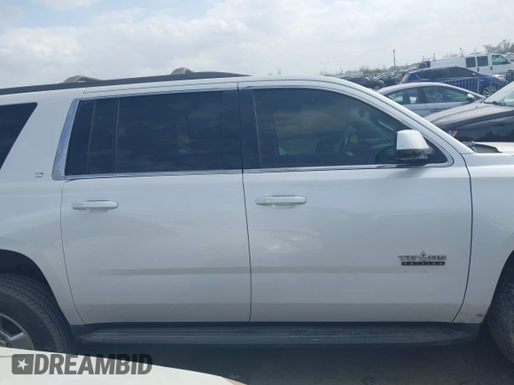 2016 Chevrolet Suburban LT with VIN 1GNSCHKC9GR273201, listed as a IAAI auction lot 41743971 with 180,945 mi miles. Bid and sale history available at carsss.com. Image 13.