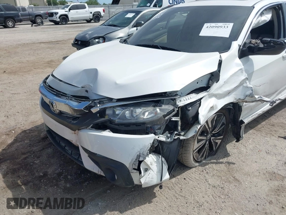 2018 Honda Civic EX-T z VIN 19XFC1F3XJE004123, wystawiony jako IAAI lot #42090933 z przebiegiem 81 228 mil mil oraz . Historia ofert i sprzedaży dostępna na DreamBid. Obrazek 6.