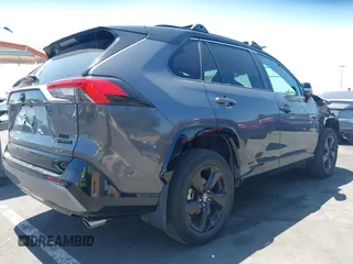 2021 Toyota RAV4 Hybrid XSE with VIN 2T3E6RFVXMW016803, listed as a IAAI auction lot 42135617 with 40,898 mi miles and . Bid and sale history available at DreamBid. Image 4.