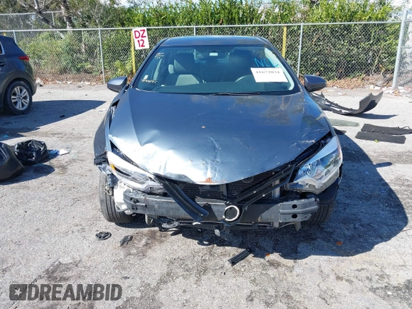 2016 Toyota Corolla L with VIN 5YFBURHE1GP478560, listed as a IAAI auction lot 41672034 with 154,221 mi miles and . Bid and sale history available at DreamBid. Image 6.