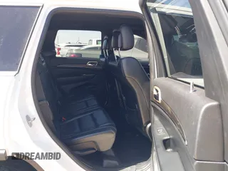 2014 Jeep Grand Cherokee Limited with VIN 1C4RJEBG6EC453833, listed as a IAAI auction lot 41901390 with 148,576 mi miles and . Bid and sale history available at DreamBid. Image 8.