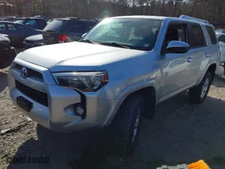 2016 Toyota 4Runner Limited with VIN JTEBU5JR1G5283914, listed as a IAAI auction lot 41340576 with 164,849 mi miles. Bid and sale history available at carsss.com. Image 2.