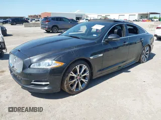 2015 Jaguar XJ R-Sport with VIN SAJWJ1CD6F8V83990, listed as a IAAI auction lot 41936162 with Not Provided miles and . Bid and sale history available at DreamBid. Image 2.