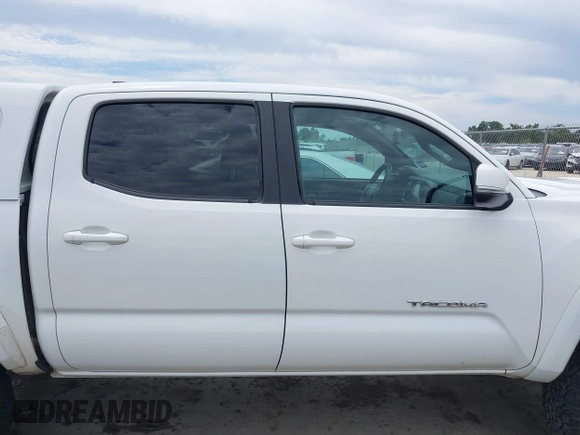 2017 Toyota Tacoma SR5 z VIN 5TFCZ5ANXHX065886, wystawiony jako IAAI lot #42308228 z przebiegiem 294 931 mil mil oraz . Historia ofert i sprzedaży dostępna na DreamBid. Obrazek 13.