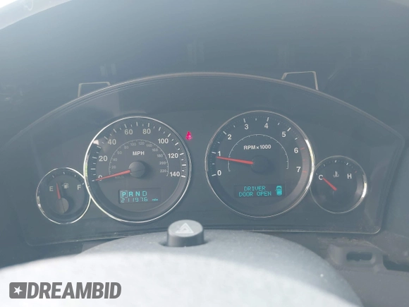 2007 Jeep Commander with VIN 1J8HG48N77C611652, listed as a IAAI auction lot 42144524 with 211,976 mi miles. Bid and sale history available at carsss.com. Image 7.