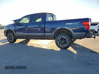 2016 Nissan Titan XD PRO-4X with VIN 1N6BA1F40GN515886, listed as a Copart auction lot 80798594 with 172,004 mi miles and Clean Title. Bid and sale history available at carsss.com. Image 2.