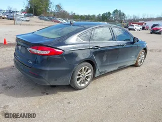 2019 Ford Fusion Hybrid SE with VIN 3FA6P0LU3KR273527, listed as a IAAI auction lot 41705167 with 169,020 mi miles. Bid and sale history available at carsss.com. Image 4.