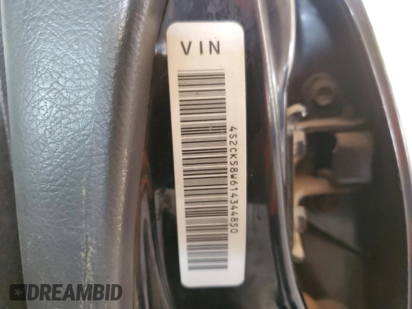 2001 Isuzu Rodeo S with VIN 4S2CK58W614344850, listed as a Copart auction lot 63807664 with 176,203 mi miles and Salvage title. Bid and sale history available at DreamBid. Image 12.