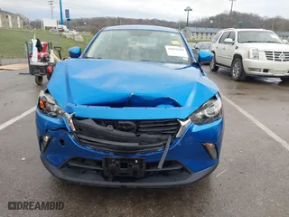 2016 Mazda CX-3 Touring with VIN JM1DKBC77G0112529, listed as a IAAI auction lot 41852258 with 134,412 mi miles. Bid and sale history available at carsss.com. Image 12.