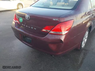 2006 Toyota Avalon XL with VIN 4T1BK36B26U077849, listed as a IAAI auction lot 41777850 with 179,719 mi miles. Bid and sale history available at carsss.com. Image 6.