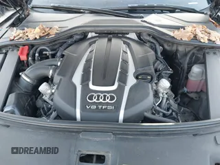 2015 Audi A8 L 4.0T with VIN WAU32AFD0FN035282, listed as a IAAI auction lot 41515136 with 76,518 mi miles. Bid and sale history available at carsss.com. Image 10.