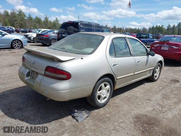 1997 Nissan Altima XE with VIN 1N4BU31D8VT205299, listed as a IAAI auction lot 42081935 with 235,426 mi miles. Bid and sale history available at carsss.com. Image 4.
