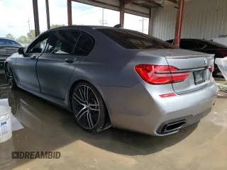 2017 BMW 7 Series 750i with VIN WBA7F0C37HGM22348, listed as a Copart auction lot 65400123 with 0 mi miles. Bid and sale history available at carsss.com. Image 2.