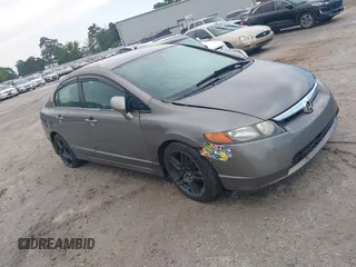 2006 Honda Civic LX z VIN 1HGFA16586L136532, wystawiony jako IAAI lot #42262770 z przebiegiem 212 076 mil mil oraz . Historia ofert i sprzedaży dostępna na DreamBid. Obrazek 1.