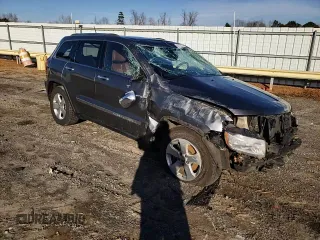2013 Jeep Grand Cherokee Overland with VIN 1C4RJFCG0DC607214, listed as a Copart auction lot 43672575 with 188,026 mi miles and Salvage Title. Bid and sale history available at carsss.com. Image 12.