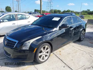 2014 Cadillac ATS Standard RWD z VIN 1G6AA5RA6E0146052, wystawiony jako IAAI lot #40220255 z przebiegiem 128 569 mil mil oraz . Historia ofert i sprzedaży dostępna na DreamBid. Obrazek 2.
