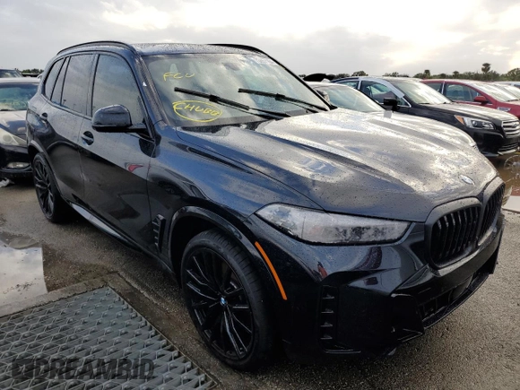 2025 BMW X5 sDrive40i with VIN 5UX13EU05S9W56291, listed as a Copart auction lot 73857164 with 0 mi miles and Salvage Title. Bid and sale history available at carsss.com. Image 4.