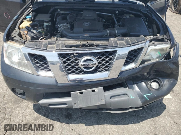 2015 Nissan Frontier SV with VIN 1N6AD0ER4FN767942, listed as a Copart auction lot 60911325 with 118,611 mi miles and Salvage title. Bid and sale history available at DreamBid. Image 11.