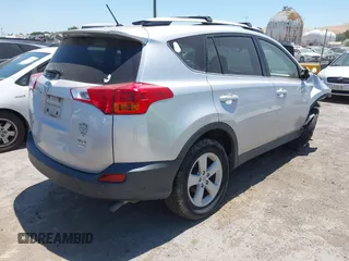 2013 Toyota RAV4 XLE with VIN JTMRFREV1DD030959, listed as a IAAI auction lot 42662601 with 99,719 mi miles and . Bid and sale history available at DreamBid. Image 4.
