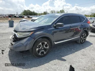2017 Honda CR-V Touring with VIN 5J6RW1H90HL011552, listed as a Copart auction lot 65984885 with 204,105 mi miles and Salvage title. Bid and sale history available at DreamBid. Image 1.