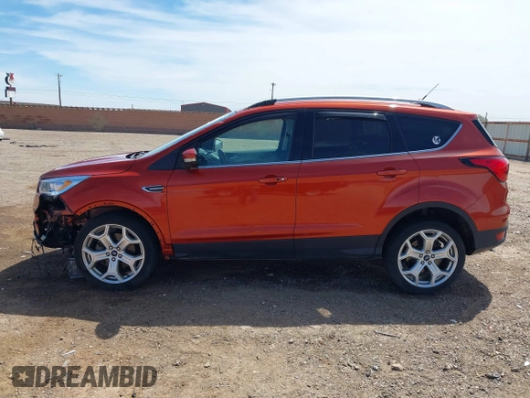 2019 Ford Escape Titanium with VIN 1FMCU9J92KUB28895, listed as a IAAI auction lot 42065235 with 112,305 mi miles and . Bid and sale history available at DreamBid. Image 14.