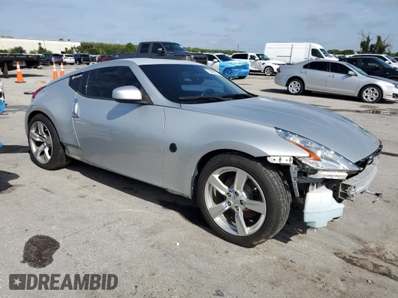 2010 Nissan 370Z Touring with VIN JN1AZ4EH2AM506507, listed as a Copart auction lot 70469504 with 115,594 mi miles and Salvage Title. Bid and sale history available at carsss.com. Image 4.