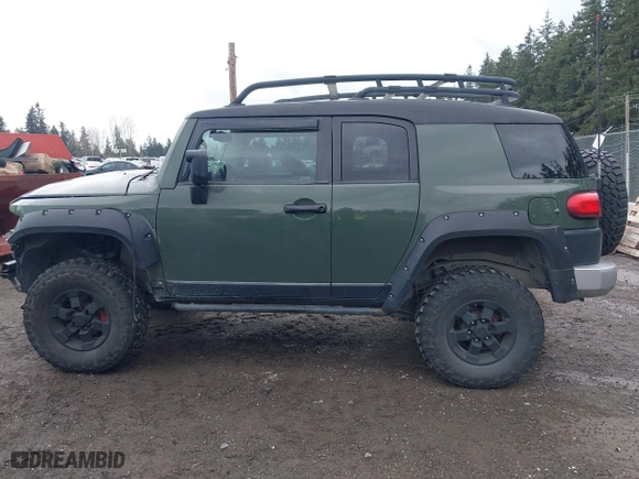 2011 Toyota FJ Cruiser with VIN JTEBU4BF5BK108168, listed as a IAAI auction lot 41829688 with 163,354 mi miles. Bid and sale history available at carsss.com. Image 15.