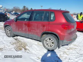 2013 Volkswagen Tiguan S with VIN WVGAV3AX2DW063067, listed as a IAAI auction lot 41638749 with 150,115 mi miles and . Bid and sale history available at DreamBid. Image 3.