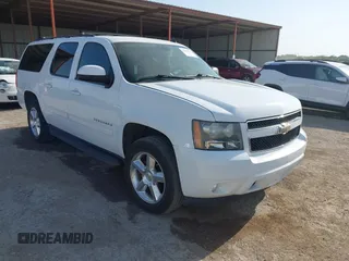 2011 Chevrolet Suburban LT z VIN 1GNSCJE02BR160367, wystawiony jako IAAI lot #42023236 z przebiegiem 158 689 mil mil oraz . Historia ofert i sprzedaży dostępna na DreamBid. Obrazek 1.
