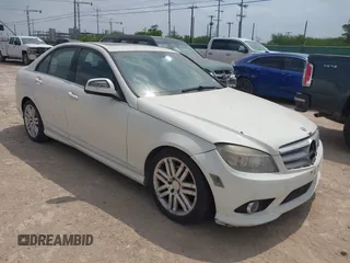 2009 Mercedes-Benz C-Class 3.0L Sport with VIN WDDGF54X39F200565, listed as a IAAI auction lot 42077156 with 169,248 mi miles. Bid and sale history available at carsss.com. Image 1.