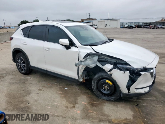 2018 Mazda CX-5 Touring z VIN JM3KFACM0J0469433, wystawiony jako Copart lot #54349955 z przebiegiem Nie podano mil oraz Szkoda całkowita • Salvage title. Historia ofert i sprzedaży dostępna na DreamBid. Obrazek 4.