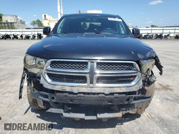 2013 Dodge Durango SXT with VIN 1C4RDJAG3DC575923, listed as a Copart auction lot 60100195 with 211,606 mi miles and Salvage title. Bid and sale history available at DreamBid. Image 5.