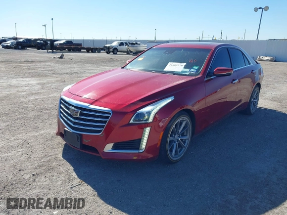 2018 Cadillac CTS Sedan Luxury AWD with VIN 1G6AX5SX0J0141744, listed as a IAAI auction lot 41402270 with 75,620 mi miles. Bid and sale history available at carsss.com. Image 2.