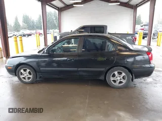 2005 Hyundai Elantra GLS z VIN KMHDN46D15U949573, wystawiony jako IAAI lot #41870209 z przebiegiem 175 819 mil mil oraz . Historia ofert i sprzedaży dostępna na DreamBid. Obrazek 14.