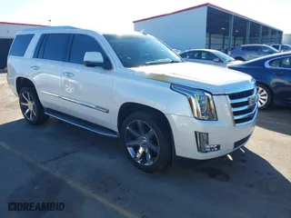 2016 Cadillac Escalade Luxury Collection with VIN 1GYS4BKJ4GR339343, listed as a IAAI auction lot 41456214 with 114,777 mi miles. Bid and sale history available at carsss.com. Image 1.