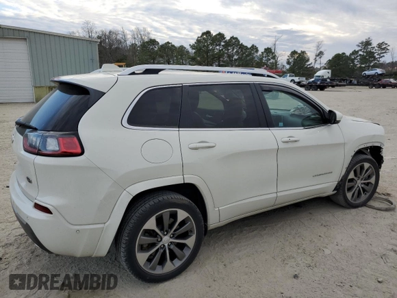 2019 Jeep Cherokee with VIN 1C4PJLJX3KD381640, listed as a Copart auction lot 42463593 with 28,310 mi miles and . Bid and sale history available at DreamBid. Image 3.