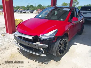 2020 Tesla Model Y Long Range with VIN 5YJYGDEE0LF029496, listed as a IAAI auction lot 41977695 with 47,958 mi miles and . Bid and sale history available at DreamBid. Image 18.