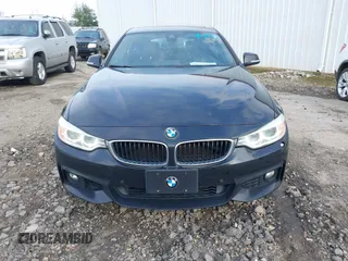 2016 BMW 4 Series 428i xDrive with VIN WBA4C9C52GG136584, listed as a IAAI auction lot 41530110 with 124,667 mi miles and . Bid and sale history available at carsss.com. Image 6.