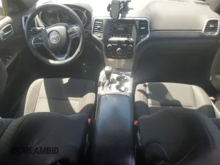 2018 Jeep Grand Cherokee Laredo E with VIN 1C4RJFAGXJC427382, listed as a Copart auction lot 54518805 with 68,356 mi miles and Salvage Title. Bid and sale history available at DreamBid. Image 8.