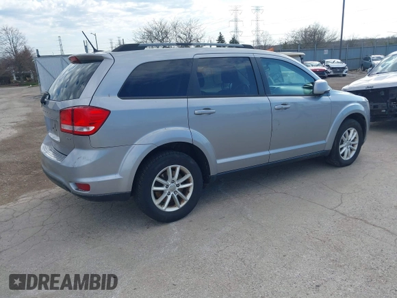 2017 Dodge Journey SXT z VIN 3C4PDDBG6HT595309, wystawiony jako IAAI lot #41918029 z przebiegiem 127 247 mil mil oraz . Historia ofert i sprzedaży dostępna na DreamBid. Obrazek 4.