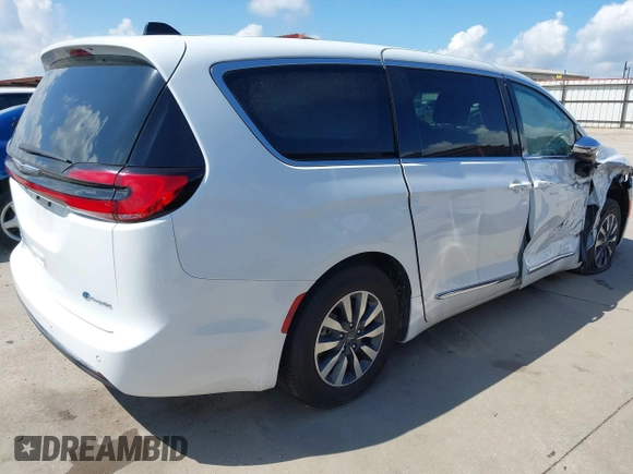 2023 Chrysler Pacifica Hybrid Limited with VIN 2C4RC1S75PR559106, listed as a IAAI auction lot 42613325 with 62,749 mi miles and . Bid and sale history available at DreamBid. Image 4.