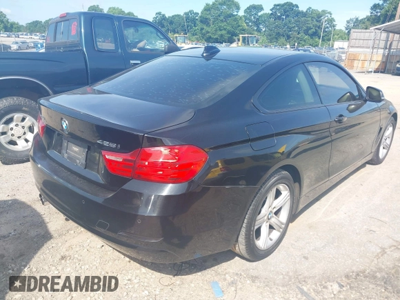 2014 BMW 4 Series 428i xDrive with VIN WBA3N5C52EF716998, listed as a IAAI auction lot 42548467 with 212,418 mi miles and . Bid and sale history available at DreamBid. Image 4.