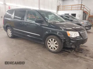 2013 Chrysler Town & Country Touring z VIN 2C4RC1BG0DR742005, wystawiony jako IAAI lot #42386516 z przebiegiem 200 982 mil mil oraz . Historia ofert i sprzedaży dostępna na DreamBid. Obrazek 1.