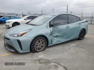 2021 Toyota Prius L Eco z VIN JTDKAMFU4M3136370, wystawiony jako Copart lot #53513905 z przebiegiem 63 165 mil mil oraz Szkoda całkowita • Salvage title. Historia ofert i sprzedaży dostępna na DreamBid. Obrazek 1.