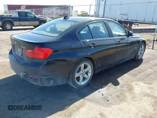 2015 BMW 3 Series 320i with VIN WBA3B1C58F5A05933, listed as a IAAI auction lot 41749755 with Not Provided miles. Bid and sale history available at carsss.com. Image 4.