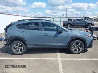 2024 Subaru Crosstrek Premium with VIN JF2GUADC6R8306021, listed as a IAAI auction lot 42078539 with 28,497 mi miles and . Bid and sale history available at DreamBid. Image 14.