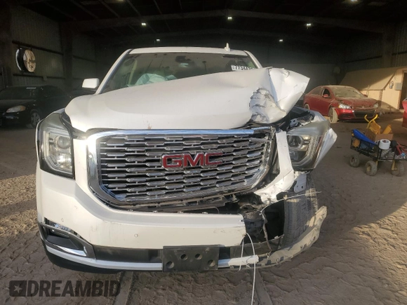 2019 GMC Yukon Denali with VIN 1GKS1CKJ7KR370524, listed as a Copart auction lot 77344394 with 39,753 mi miles and Salvage Title. Bid and sale history available at carsss.com. Image 5.