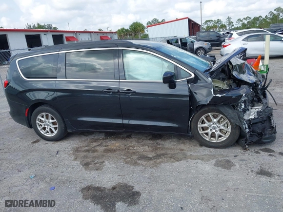 2021 Chrysler Voyager LXI with VIN 2C4RC1DG1MR515709, listed as a IAAI auction lot 41866568 with 93,883 mi miles. Bid and sale history available at carsss.com. Image 14.